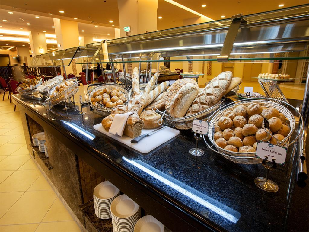 Anjum Makkah Hotel Mecca Exterior photo Breakfast buffet at a luxury hotel